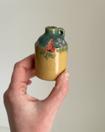Miniature Stoneware Crock Jug With A Handle And Decorated With Painted Flowers