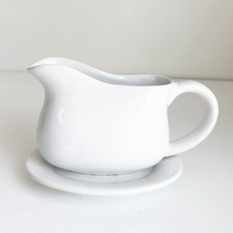 White Ceramic Gravy Boat With A Saucer