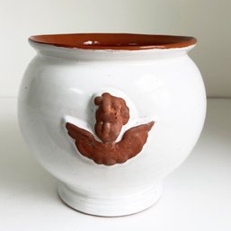 White Glazed Ceramic Pot With A Terracotta Rim And A Terracotta Angel Relief Figure. Cherub Planter.