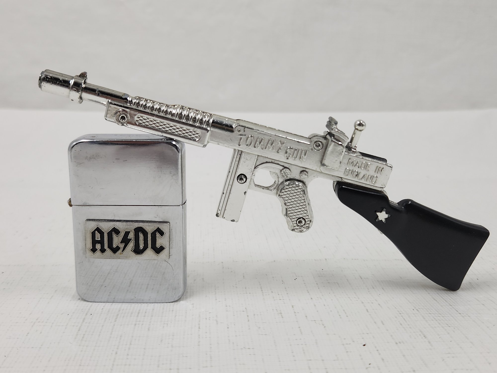 Vintage AC/DC Chrome Lighter And Lone Star