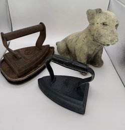 Two Antique Flat Irons And Stone Dog Sculpture