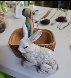 Ceramic Planter Featuring A White Rabbit Leaning Against A Woven Basket