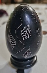 Hand-carved Black Stone Egg With Etched Leaf And Spiral Motifs