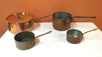 Four Copper And Brass Pots, One With Lid