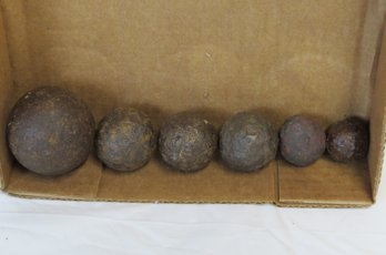 Six Various Size Cannon Balls Which Appear To Be Dug Up, 2 To 1