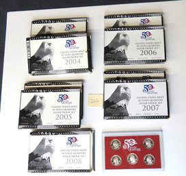 Nine U. S. Mint 50 State Quarters Silver Proof Sets