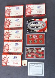 Seven U. S. Mint 50 State Quarters Silver Proof Sets