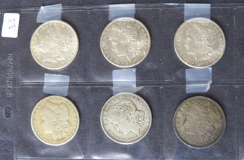 Six Morgan Silver Dollars, 1878-S, 1878-S, 1878-S, 1881-O, 1889-O, 1921-D, 1921-D
