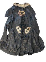 Two Black Bodices And A Cape