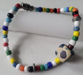 VINTAGE MULTI COLOR BEADED BRACELET WITH BARREL CLOSURE--7 1/4'L