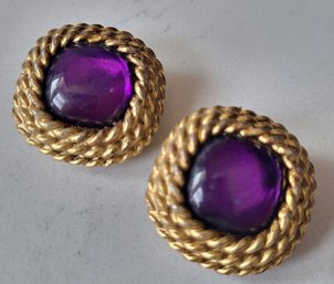 VINTAGE SIGNED 'YOSCA' GOLDTONE CLIP ON EARRINGS WITH PURPLE STONE