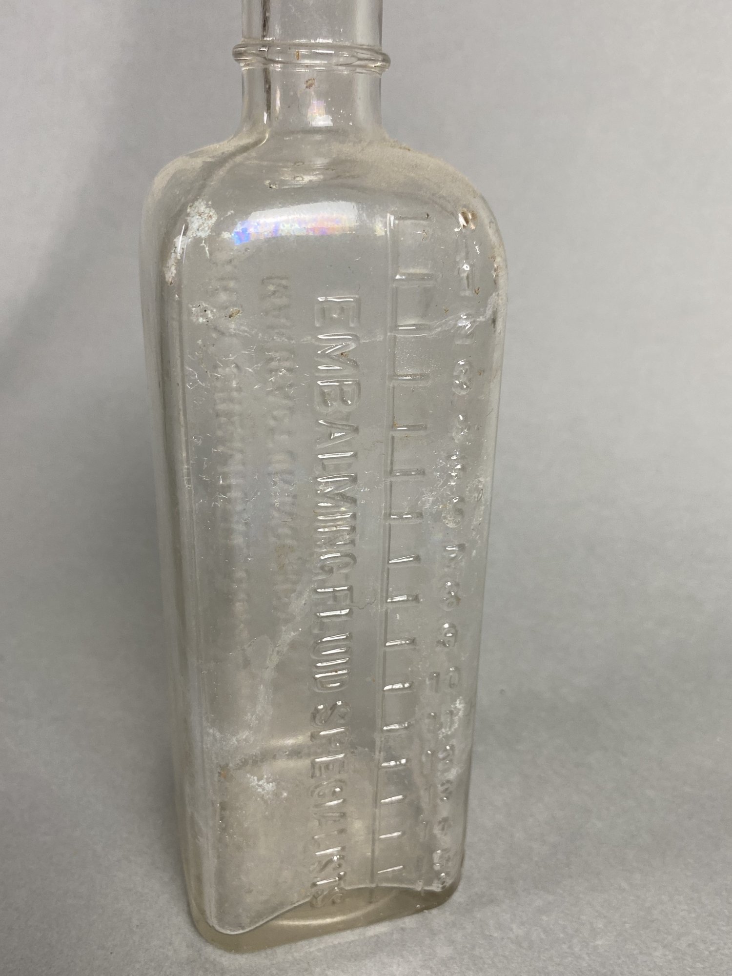 Many Vintage Glass Bottles In Different Shapes & Brands Including Gray