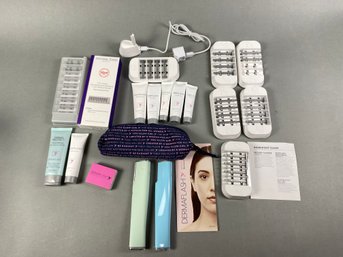 Pair Of DermaFlash Luxe Sonic Dermaplaning & Peach Fuzz Removal Sets With Replacement Blades & Charger
