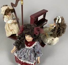 Three Porcelain Collector Dolls  Including Two Dolls That Play Music