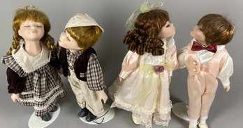 Four Porcelain Victorian Style Kissing Collector Dolls