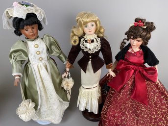 Three Pretty Porcelain Dolls Including Heritage Mint Doll