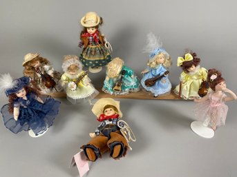Assortment Of Small Porcelain Dolls Including Ballarina, Western Dolls & Dolls With Musical Instruments
