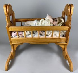 Wonderful Porcelain Baby Doll In A Solid Wood Cradle