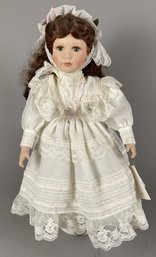 Porcelain Doll In Formal Dress Named Amy From The Court Of Dolls On Metal Stand