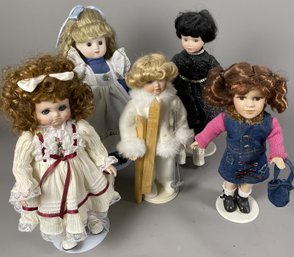 Five Porcelain Little Girl Dolls On Metal Display Stands Including A My First Collector's Doll