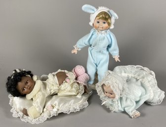 Three Porcelain Little Girl Or Baby Dolls In Pajamas