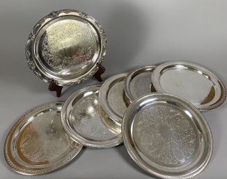 Seven Vintage Silver Plate Round Trays Or Plates
