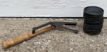 Hand Held Manual Skeet Or Clay Pigeon Thrower With A Few Clay Pigeons