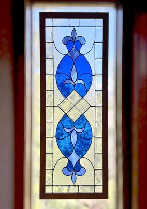 Victorian-inspired Stained Glass Window Display With Rich Royal Blue Glass And Clear Beveled Accents