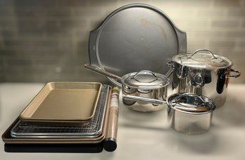 Versatile Cookware And Bakeware Collection Featuring Lidded Metal Pots, Baking Sheets And A Wilton Pizza Pan
