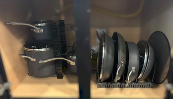 Calphalon Cookware Collection Featuring Assorted Pots And Pans, Glass Lids And Storage Racks
