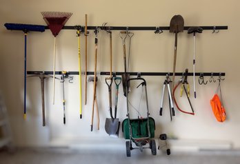 Handy Collection Of Gardening Tools Including Shovels, Rakes, And Clippers