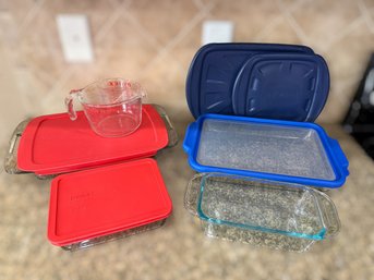 Collection Of Pyrex Baking Dishes With Lids And Liquid Measuring Cup