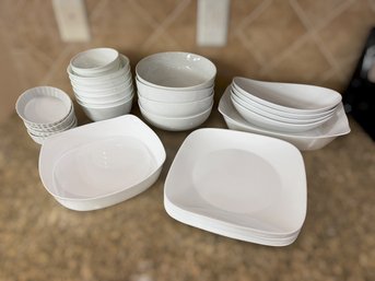Vivid White Dinnerware Collection Featuring Bowls, Plates, And Serving Dishes