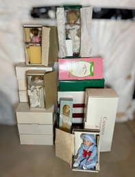 Charming Assortment Of Porcelain Dolls, Cherub Floral Dcor, Wooden Doll Rocking Cradle& More