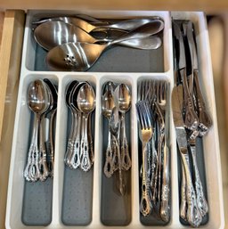 Large Assortment Of Stainless Steel Flatware And Serving Utensils