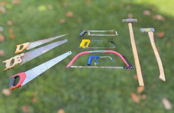Assortment Of Saws, Sledgehammer, And Axe