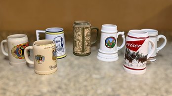 Assortment Of Various Beer Steins Including Budweiser, German Steins, And More