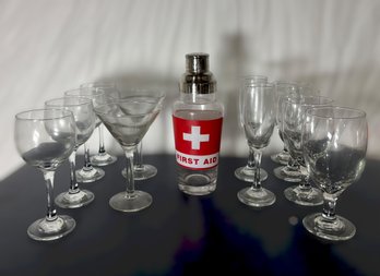 Classic Barware Collection Featuring A Novelty First Aid Cocktail Shaker And Assorted Clear Glass Stemware