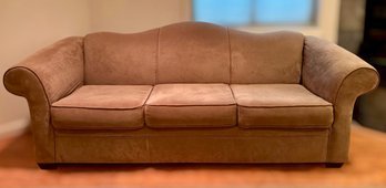 Camelback Sofa Features A Brown Microfiber Upholstery & Classic Rolled Arms