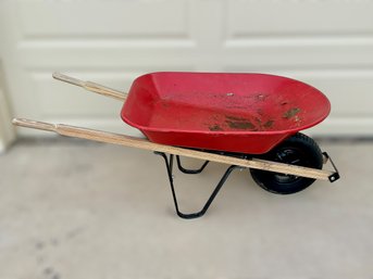 Red Plastic Wheel Barrow