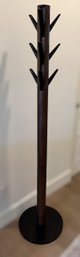 Flapper Coat Rack With Flip-down Black Metal Hooks And Rounded Metal Base