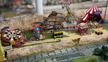 Large Mixed O Gauge Train Layout Lot Featuring Department 56, Lionel & Carnival Village Accessories - Lot 10