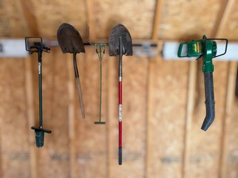 Assortment Of Landscaping Tools Featuring A Shovel,a Pitchfork-style Tool, Hole Dig & A Motorized Leaf Blower