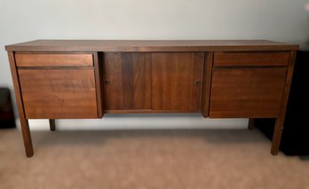 Kimball Office Furniture Vintage MCM Walnut Credenza Featuring A Central Sliding-door Cabinet & 4 Side Drawers