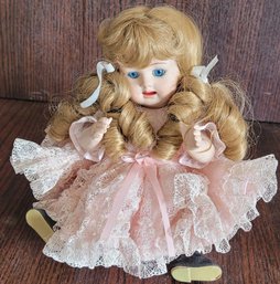 Vintage Blue Eyed Porcelain Doll