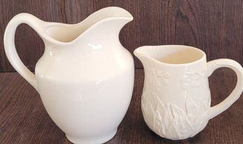 2 Different Sized Pitchers