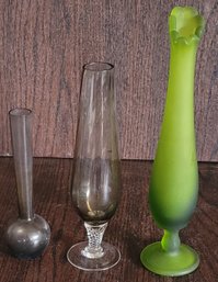 Assortment Of Different Size Vases