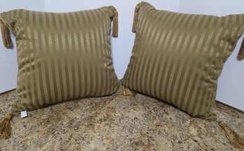 Decorative Accent Pillow Featuring A Red And Gold Diamond Pattern