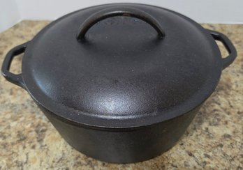 Vintage Lodge Cast Iron Dutch Oven With A Matching Lid #8