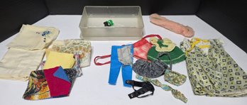 Appears To Be A Collection Of Vintage Doll Clothes And Napkins